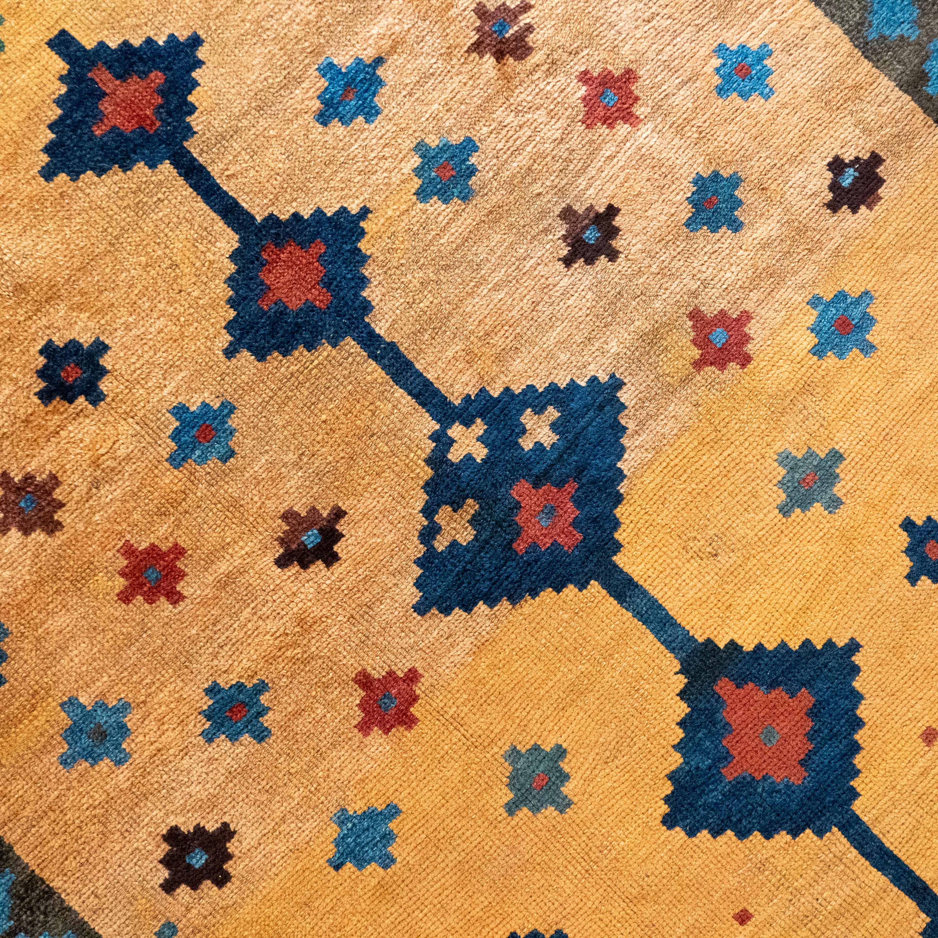 Antique Tribal Gabbeh, 7'0" x 4'9" Persian Rug with Gold and Indigo Star Motifs, Persia (c. 1925)