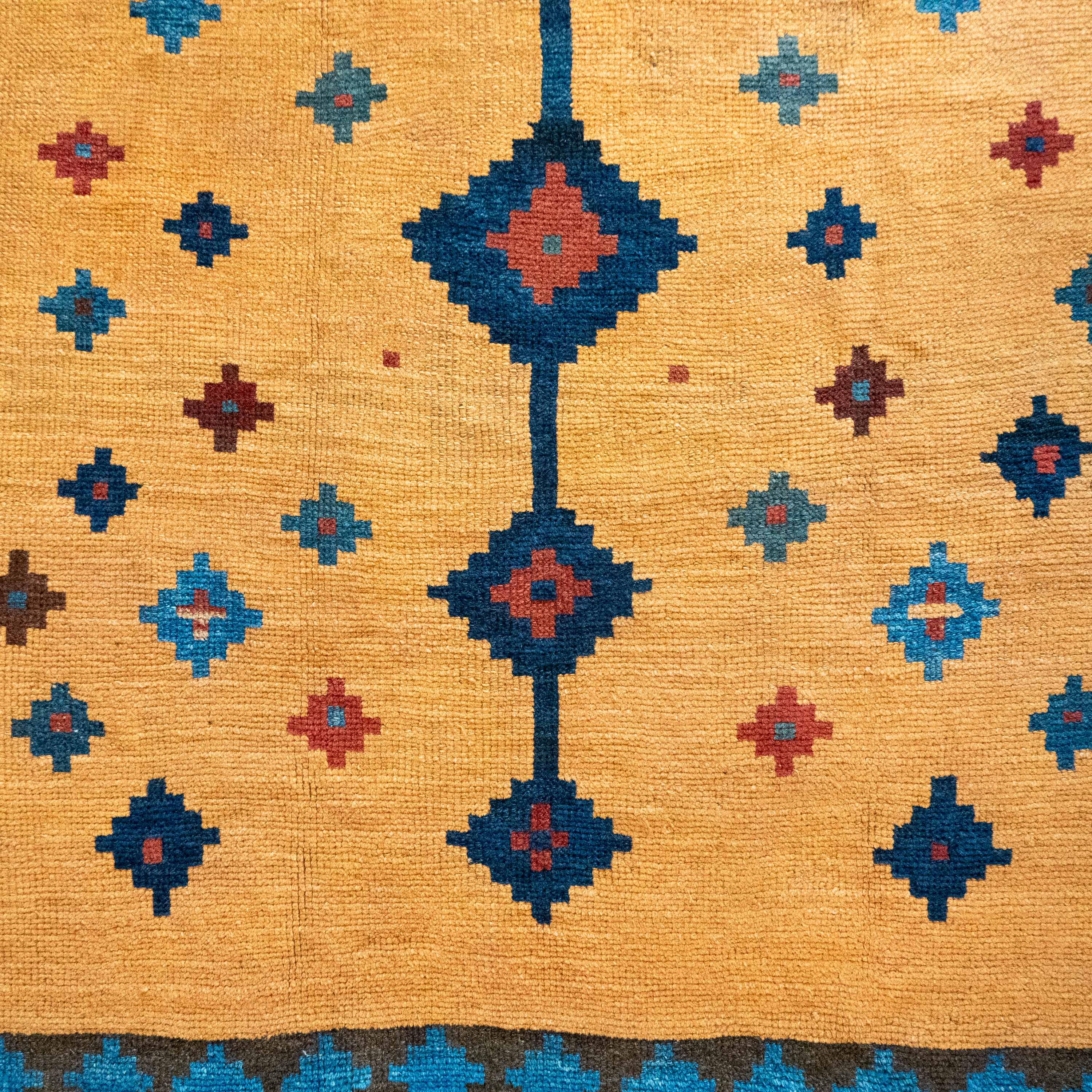 Antique Tribal Gabbeh, 7'0" x 4'9" Persian Rug with Gold and Indigo Star Motifs, Persia (c. 1925)