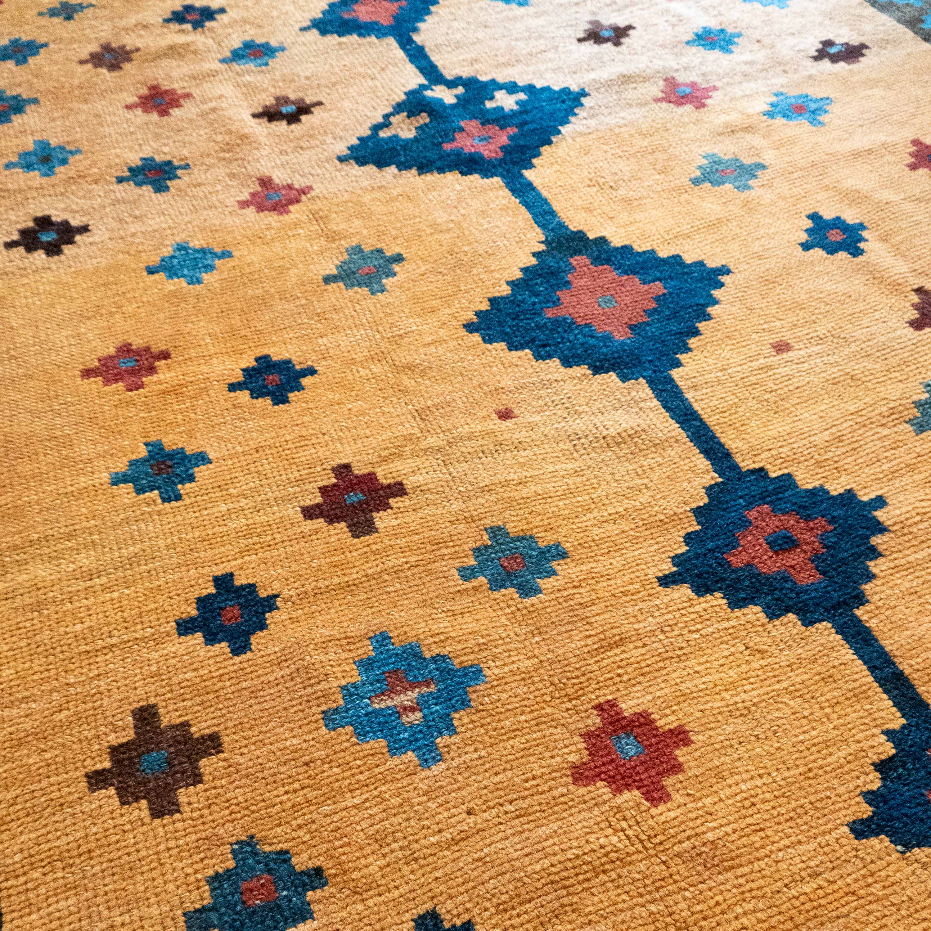 Antique Tribal Gabbeh, 7'0" x 4'9" Persian Rug with Gold and Indigo Star Motifs, Persia (c. 1925)