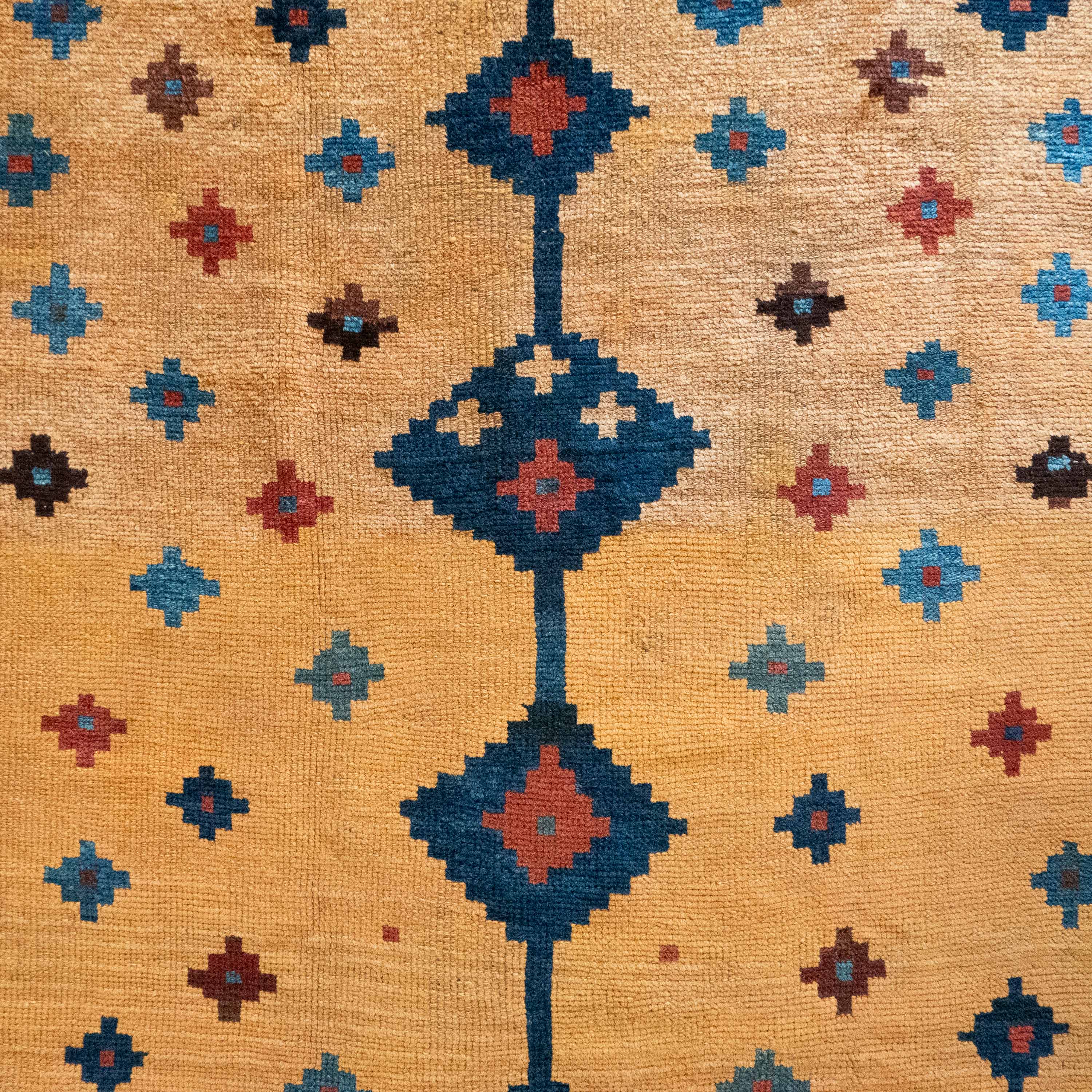Antique Tribal Gabbeh, 7'0" x 4'9" Persian Rug with Gold and Indigo Star Motifs, Persia (c. 1925)