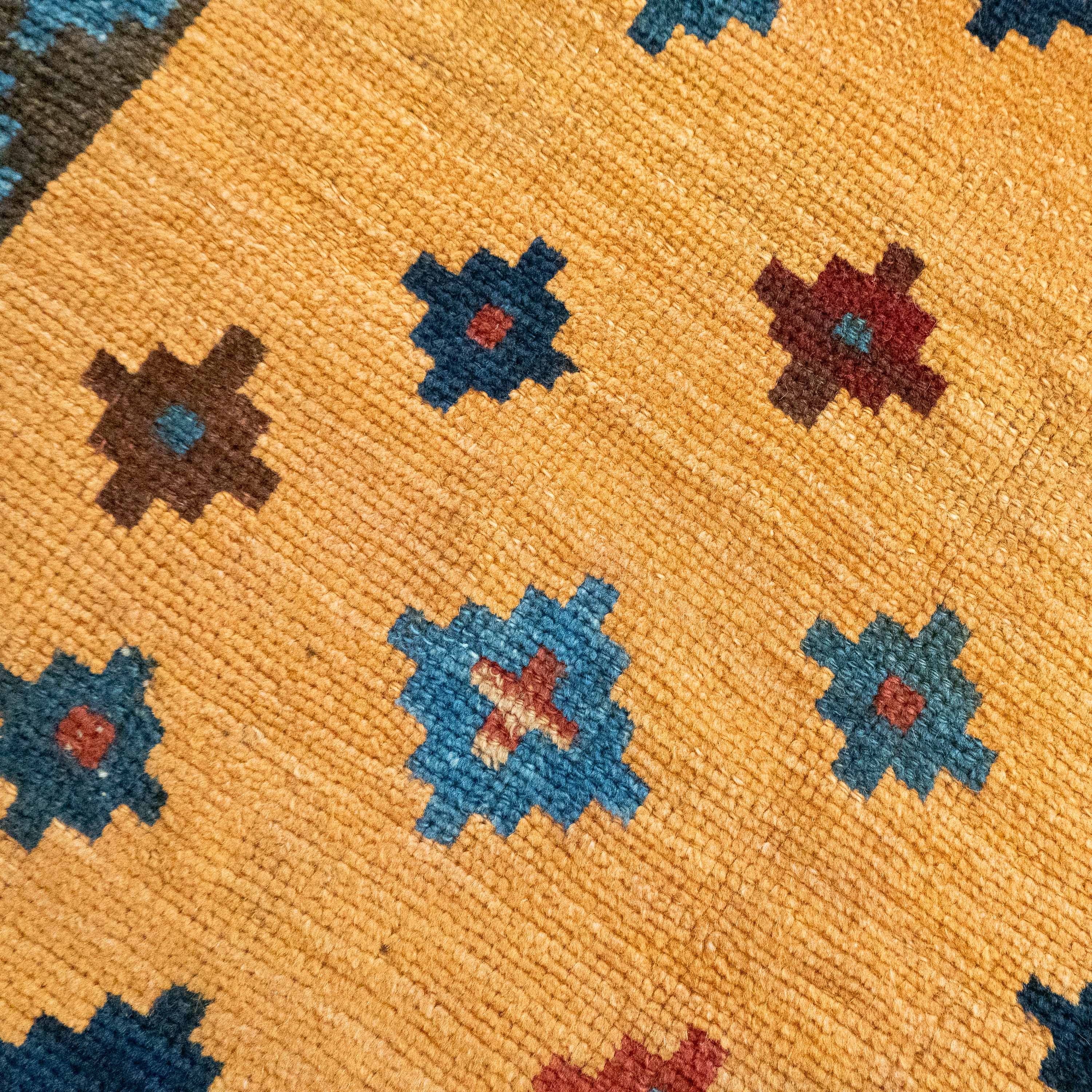 Antique Tribal Gabbeh, 7'0" x 4'9" Persian Rug with Gold and Indigo Star Motifs, Persia (c. 1925)
