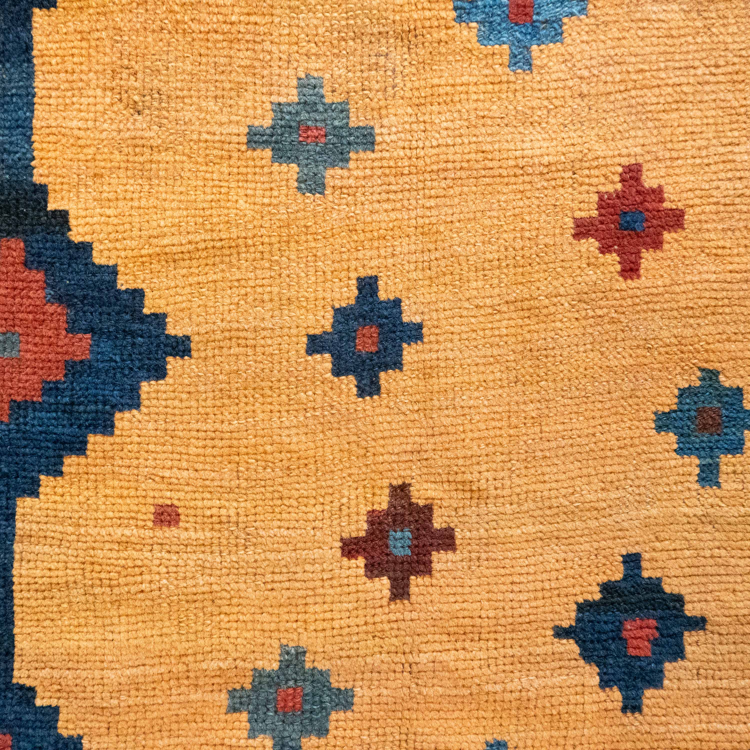 Antique Tribal Gabbeh, 7'0" x 4'9" Persian Rug with Gold and Indigo Star Motifs, Persia (c. 1925)
