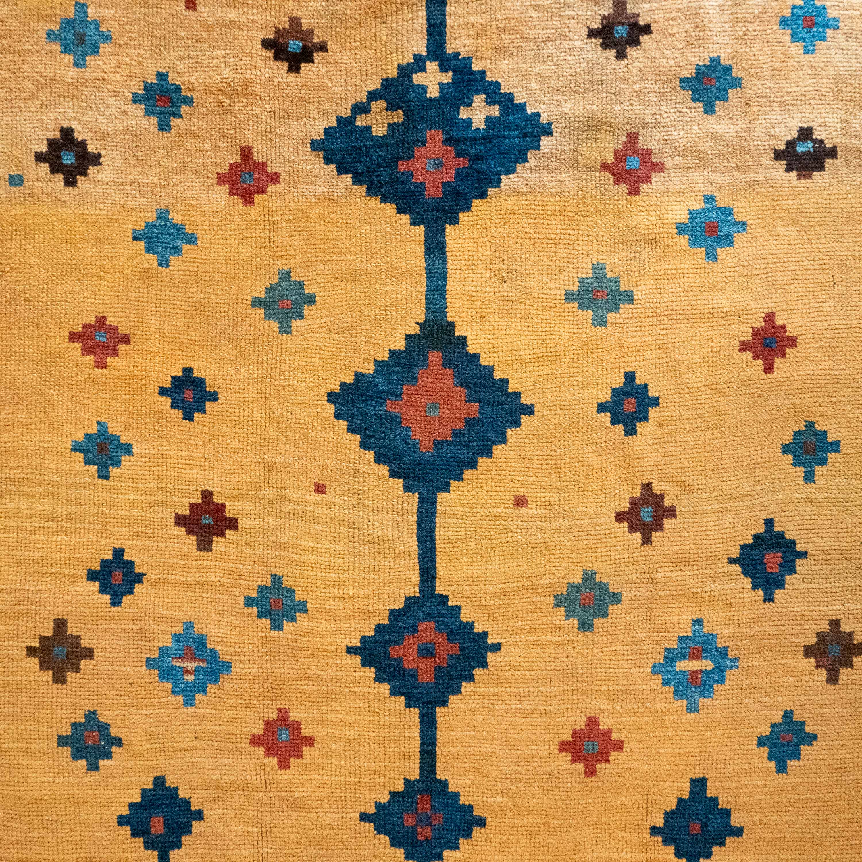 Antique Tribal Gabbeh, 7'0" x 4'9" Persian Rug with Gold and Indigo Star Motifs, Persia (c. 1925)