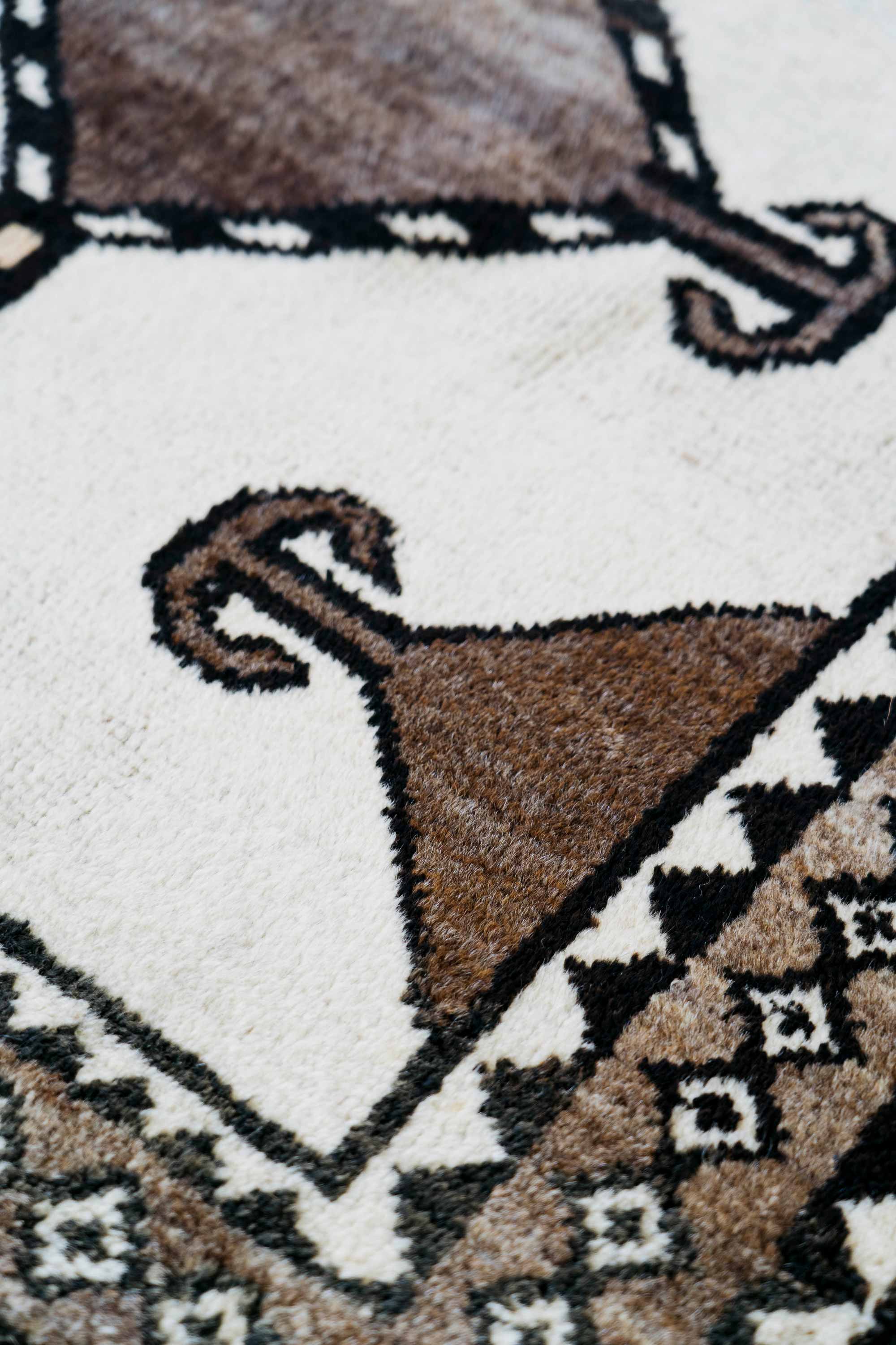Undyed Wool Qashqai ‘Serpent’ Gabbeh, Iran (Mid-20th Century)